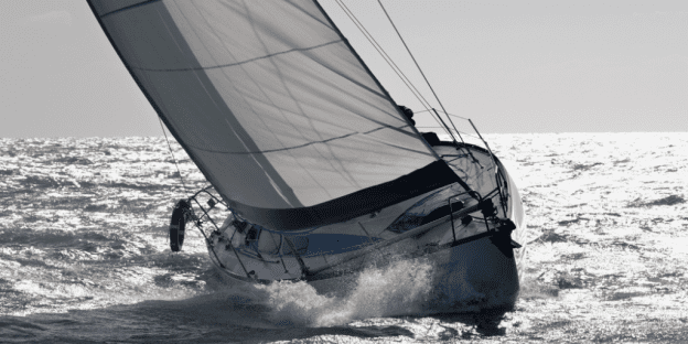 A sailboat is blown off course by high winds