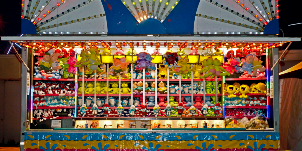 A carnival game at night