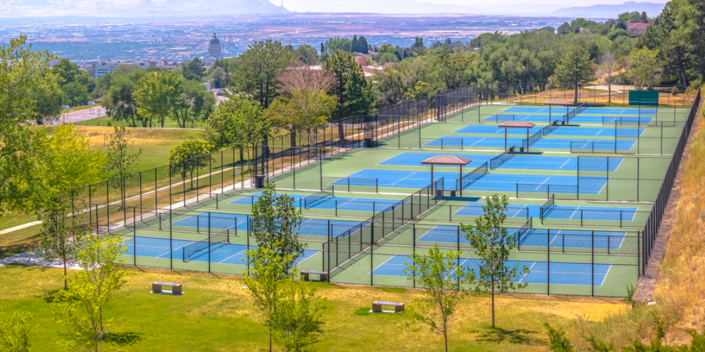 Empty tennis courts in a large complex