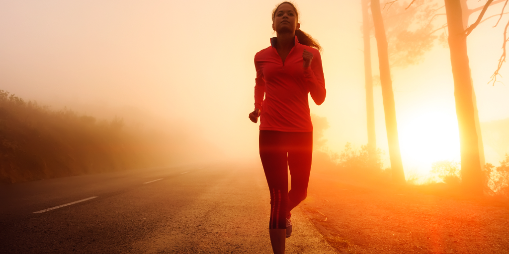 A woman is intent on running to stay in shape.
