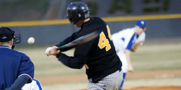 A young batter is showing promise at the plate in baseball.