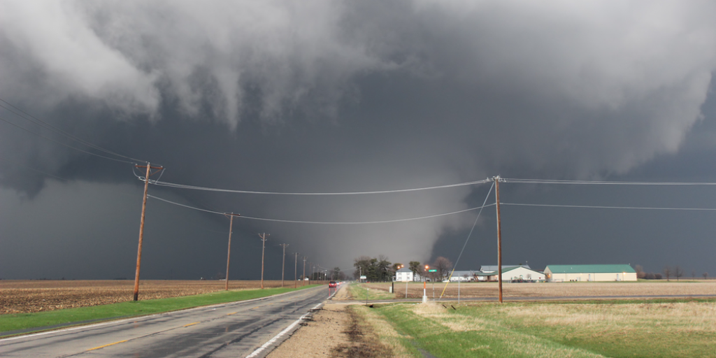 A tornado forms in the distance