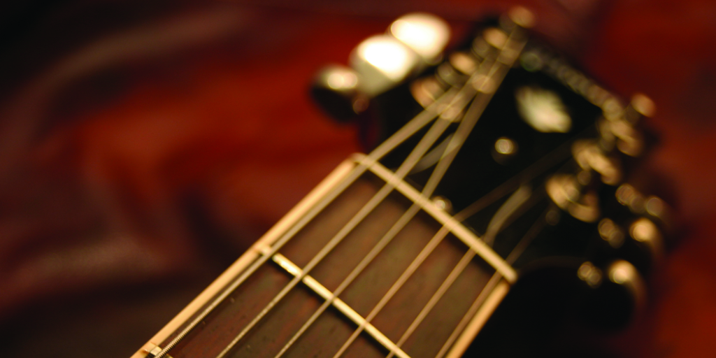 Strumming a guitar produces a chord