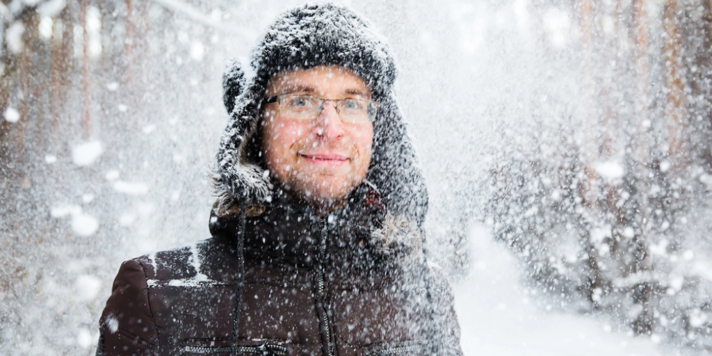 Man in fur winter hat with ear flaps