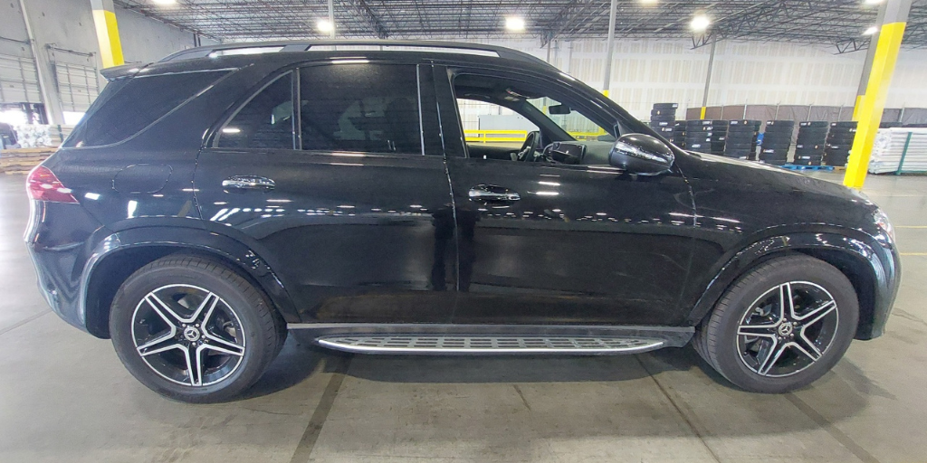 A luxury SUV in an interior parking lot