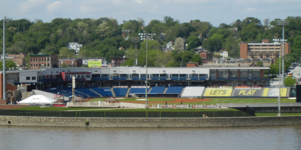 A view of a minor league baseball stadium taken from across the Mississippi River