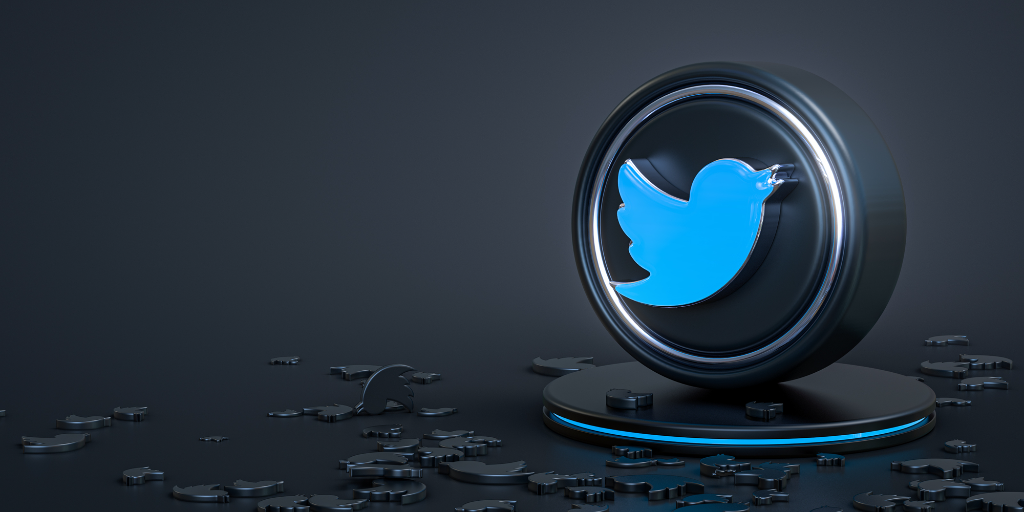 A Twitter icon on a dark background. Elon Musk is the new owner of the popular social network.