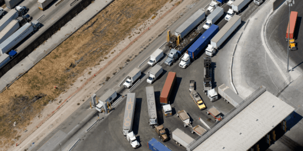 Trucks lined up waiting to cross into the U.S. from Tijuana