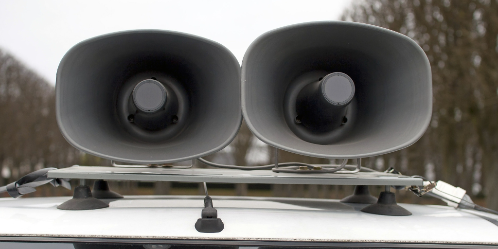 Loudspeakers on top of a car