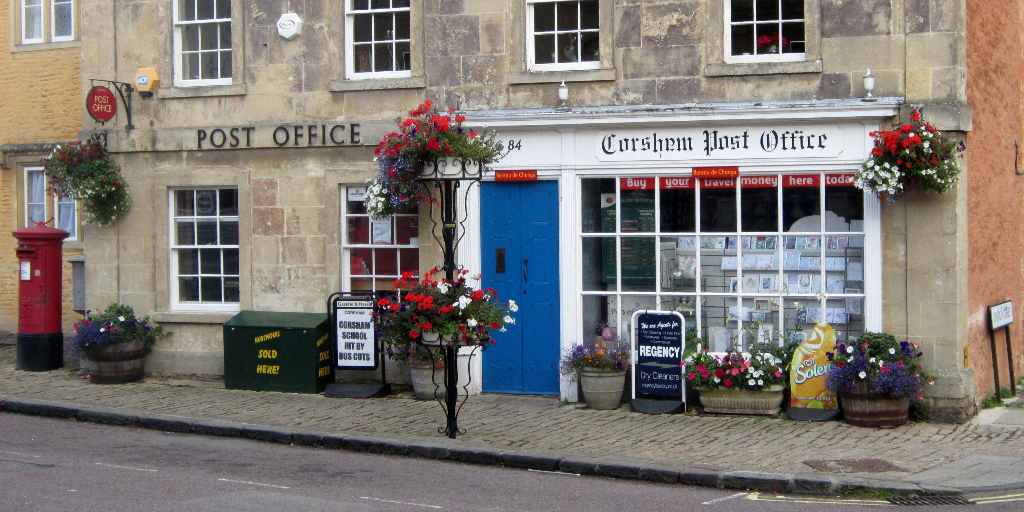 Exterior view of an English Post Office with traditional English lettering